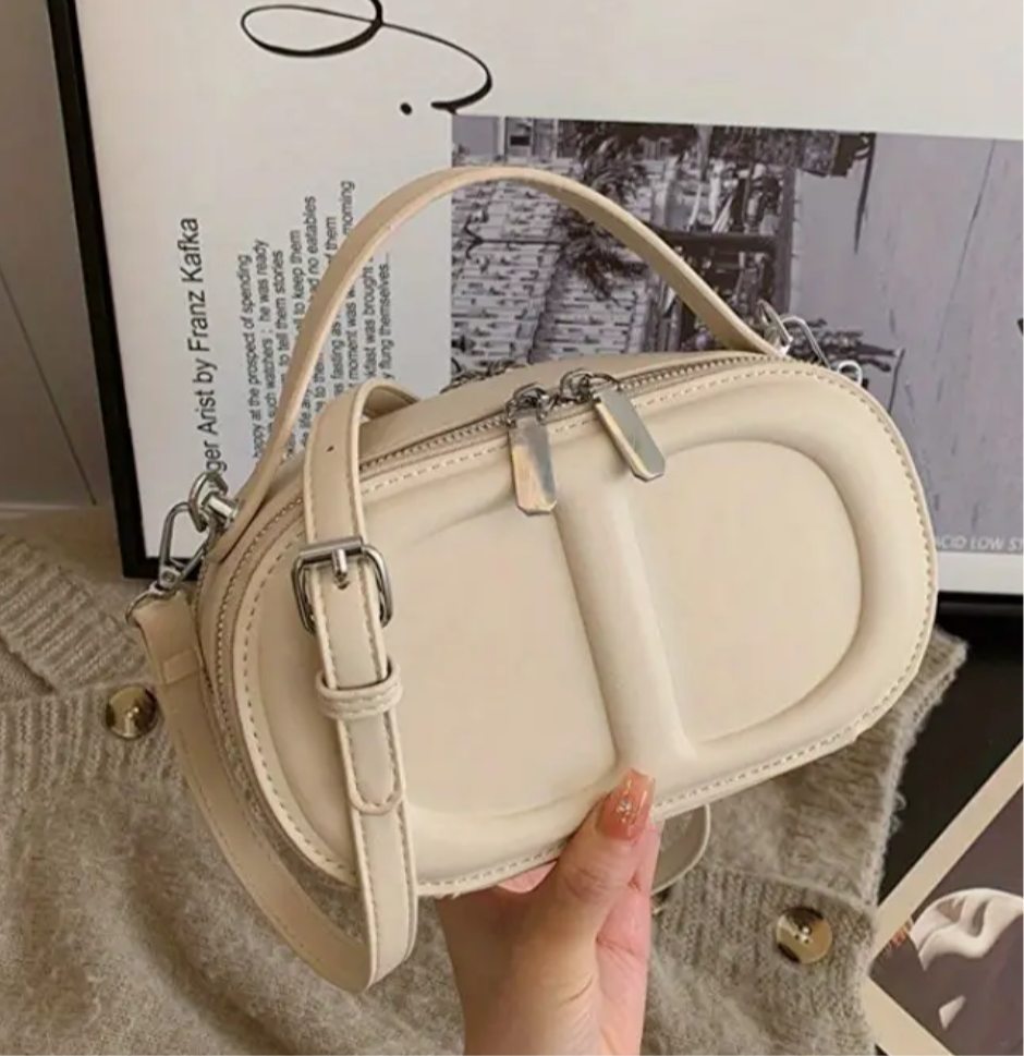 CD letter shapes cross body