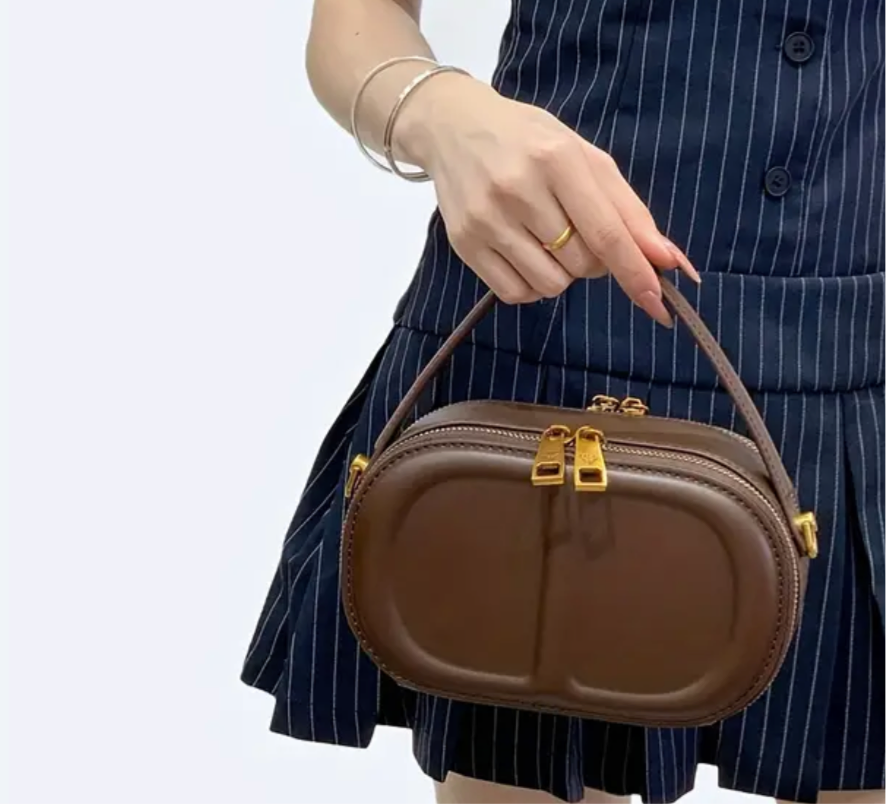 CD letter shapes cross body