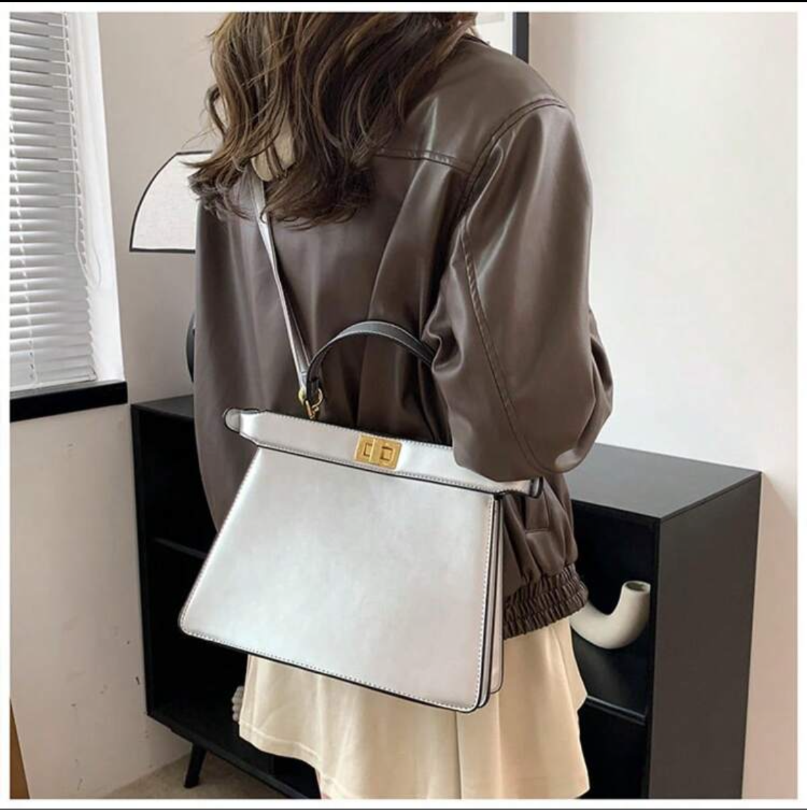 Silver leather peekaboo bag