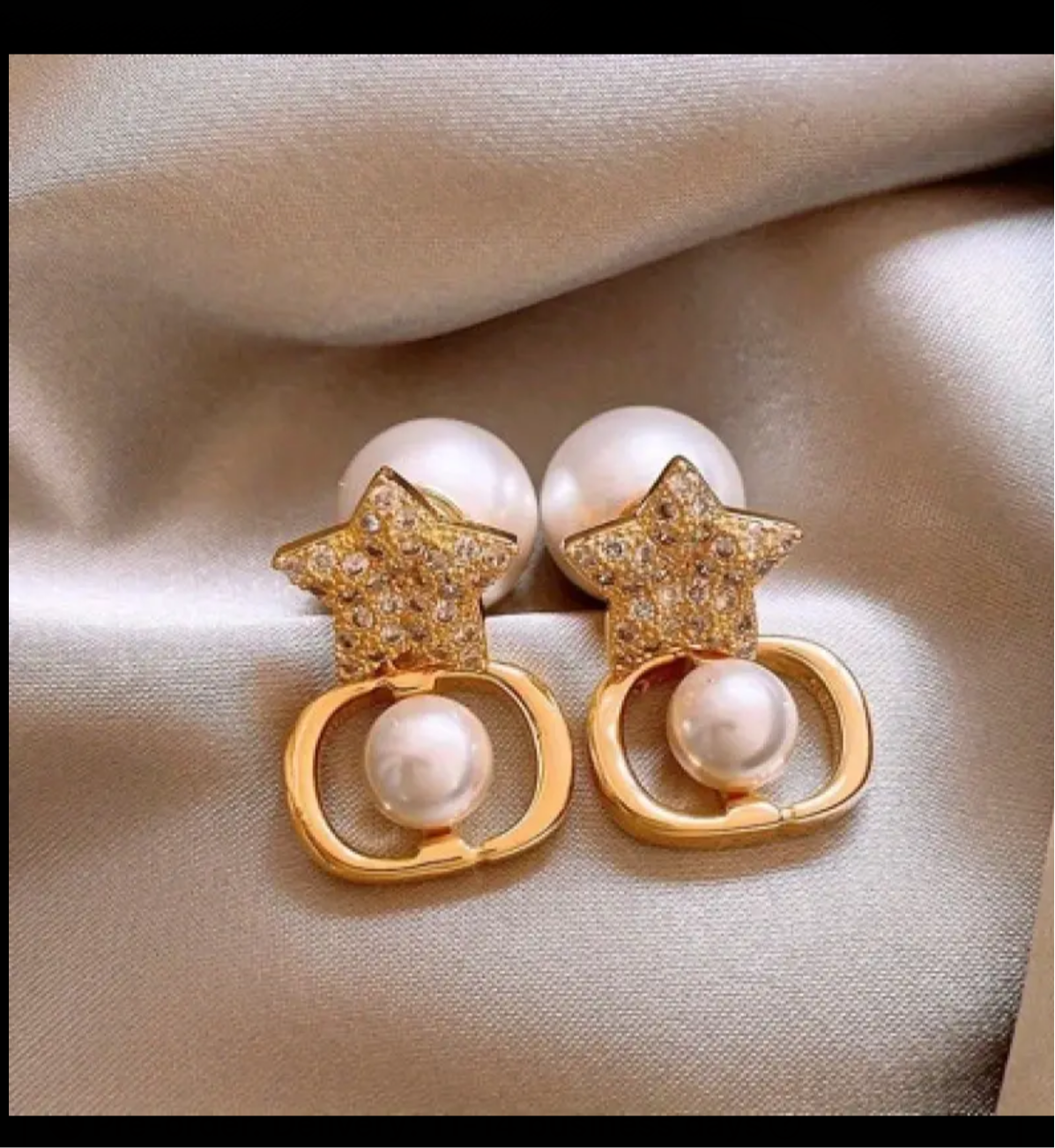 Assorted logo earrings and jewelry sets
