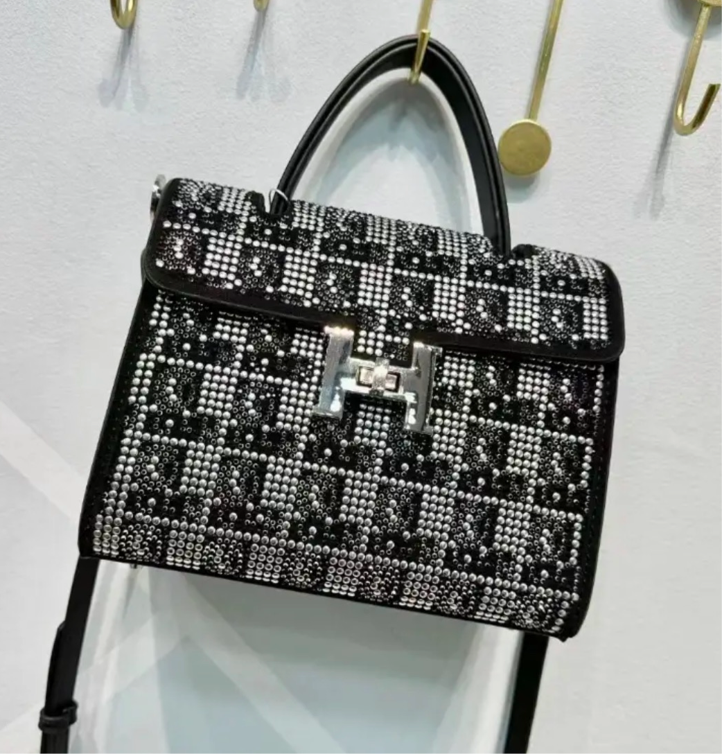 Swarovski Crystal H clutch.