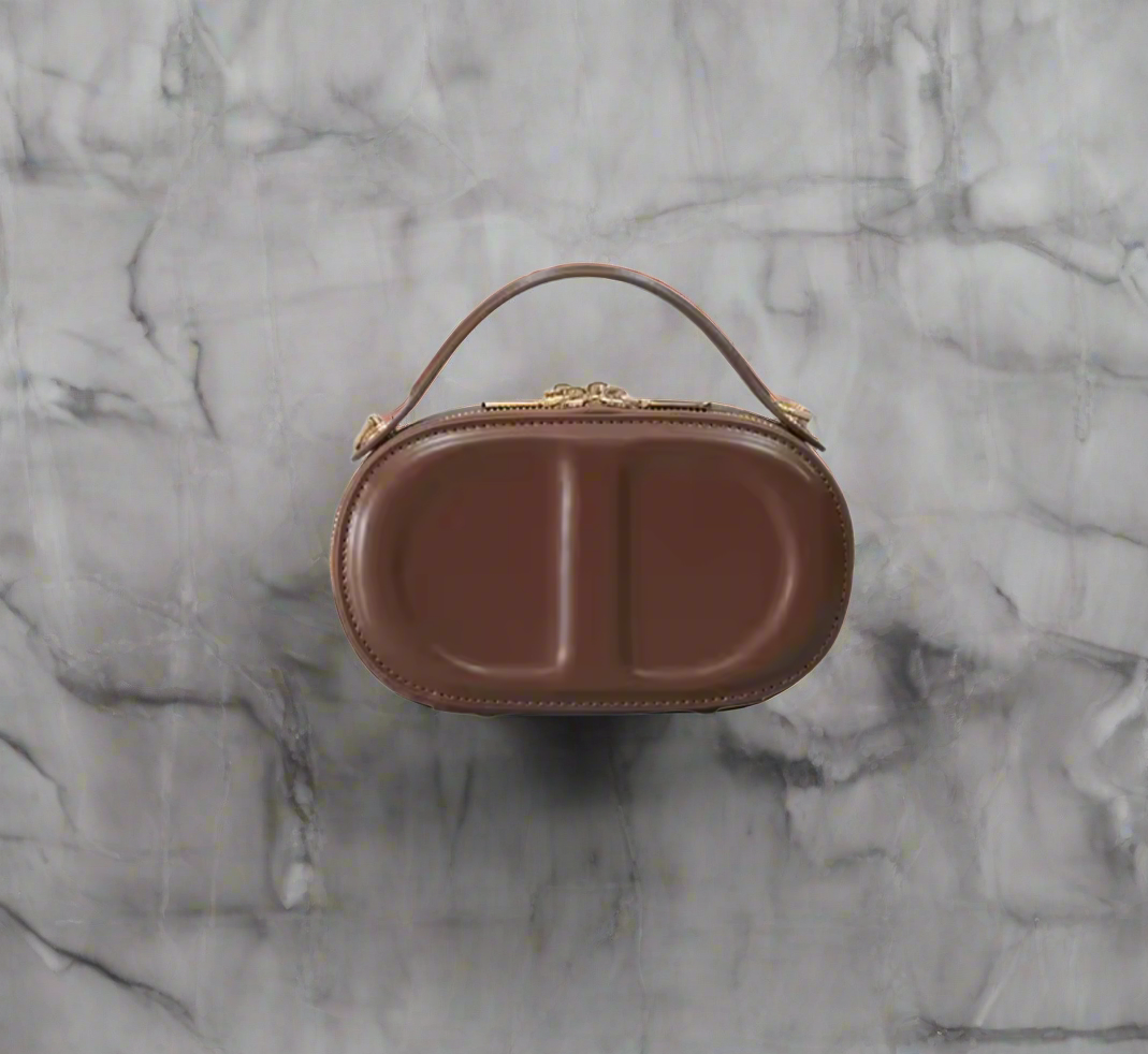 CD letter shapes cross body