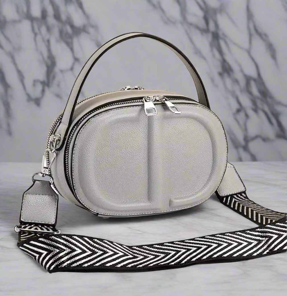 CD letter shapes cross body