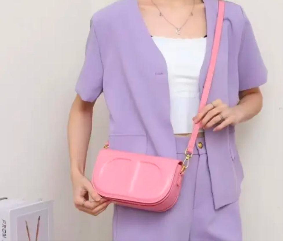 CD letter shapes cross body
