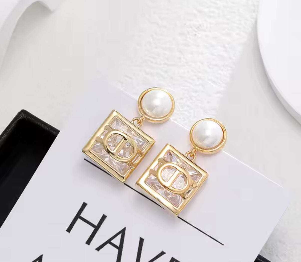 Dangling & pendant statement earrings