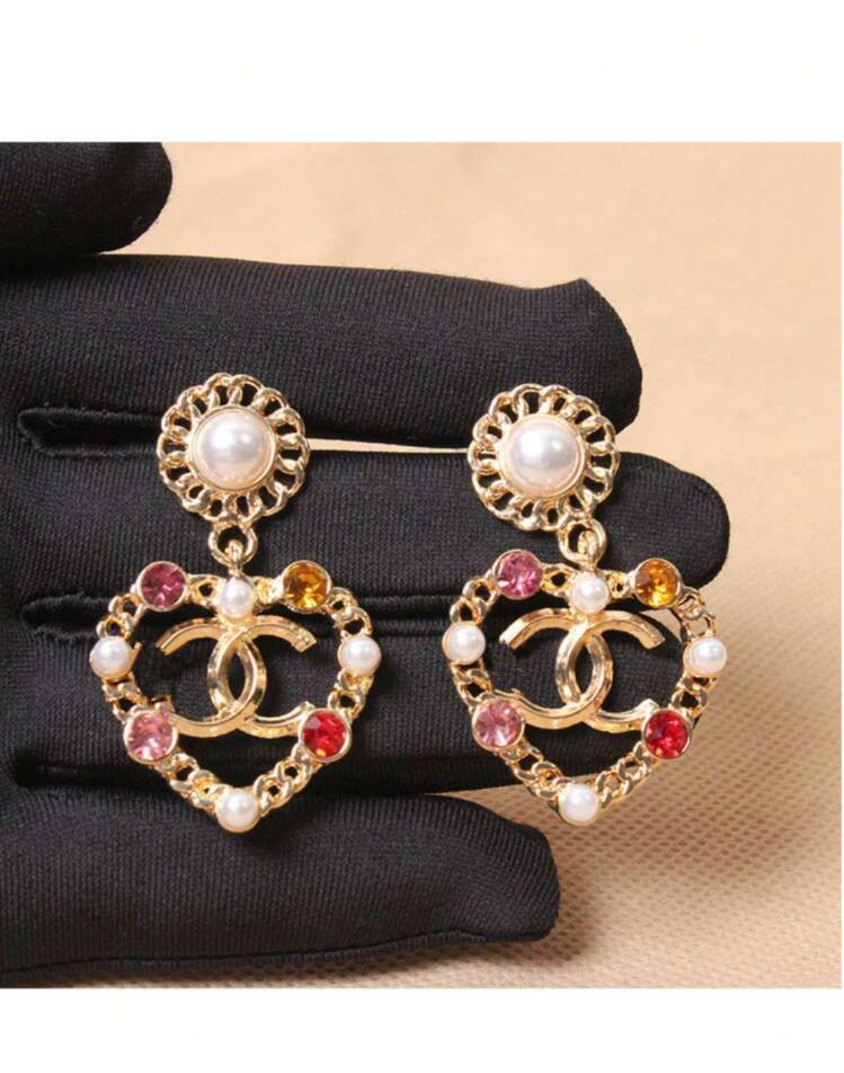 Assorted logo earrings and jewelry sets