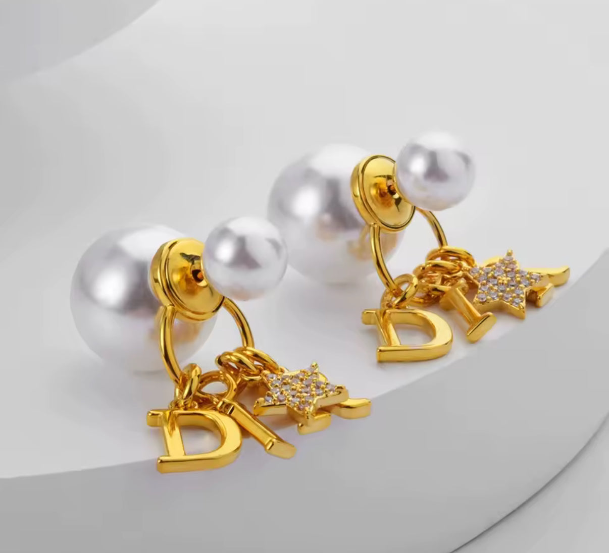 Dangling & pendant statement earrings