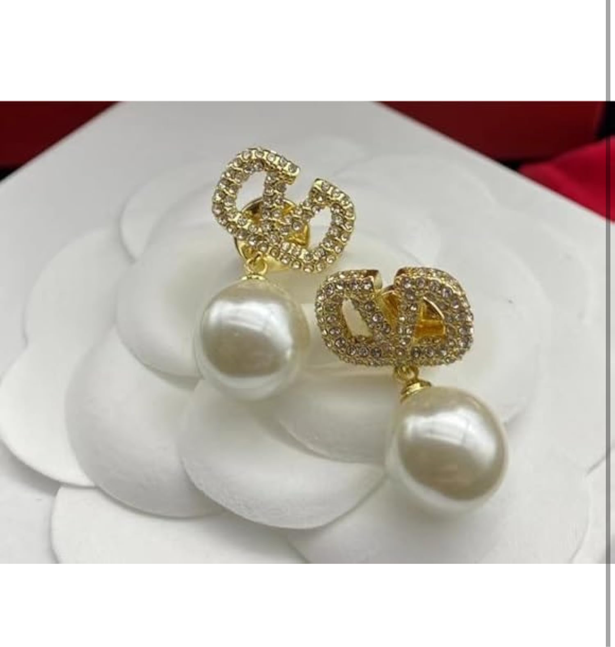 Assorted logo earrings and jewelry sets