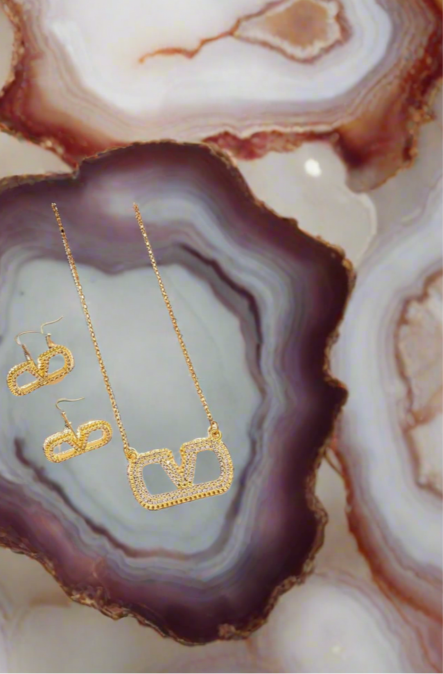 Assorted logo earrings and jewelry sets