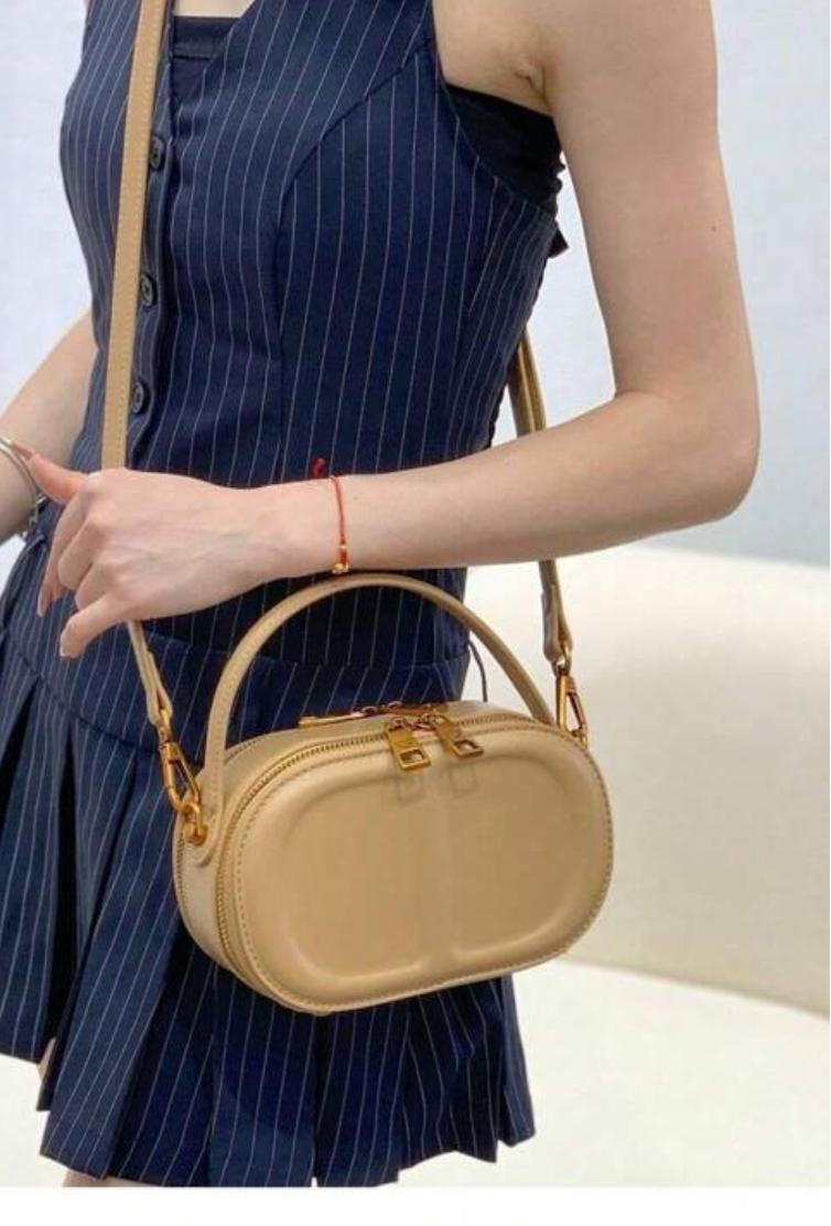 CD letter shapes cross body