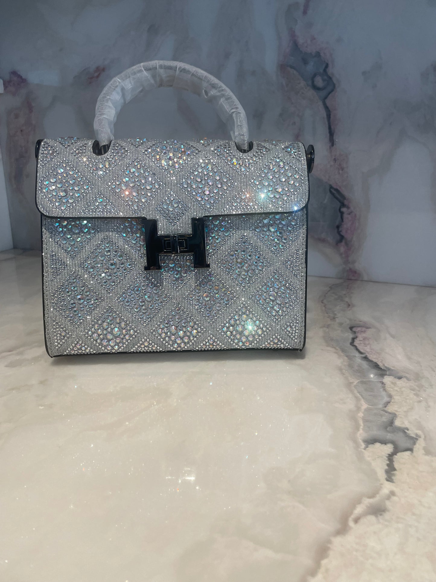 Swarovski Crystal H clutch.