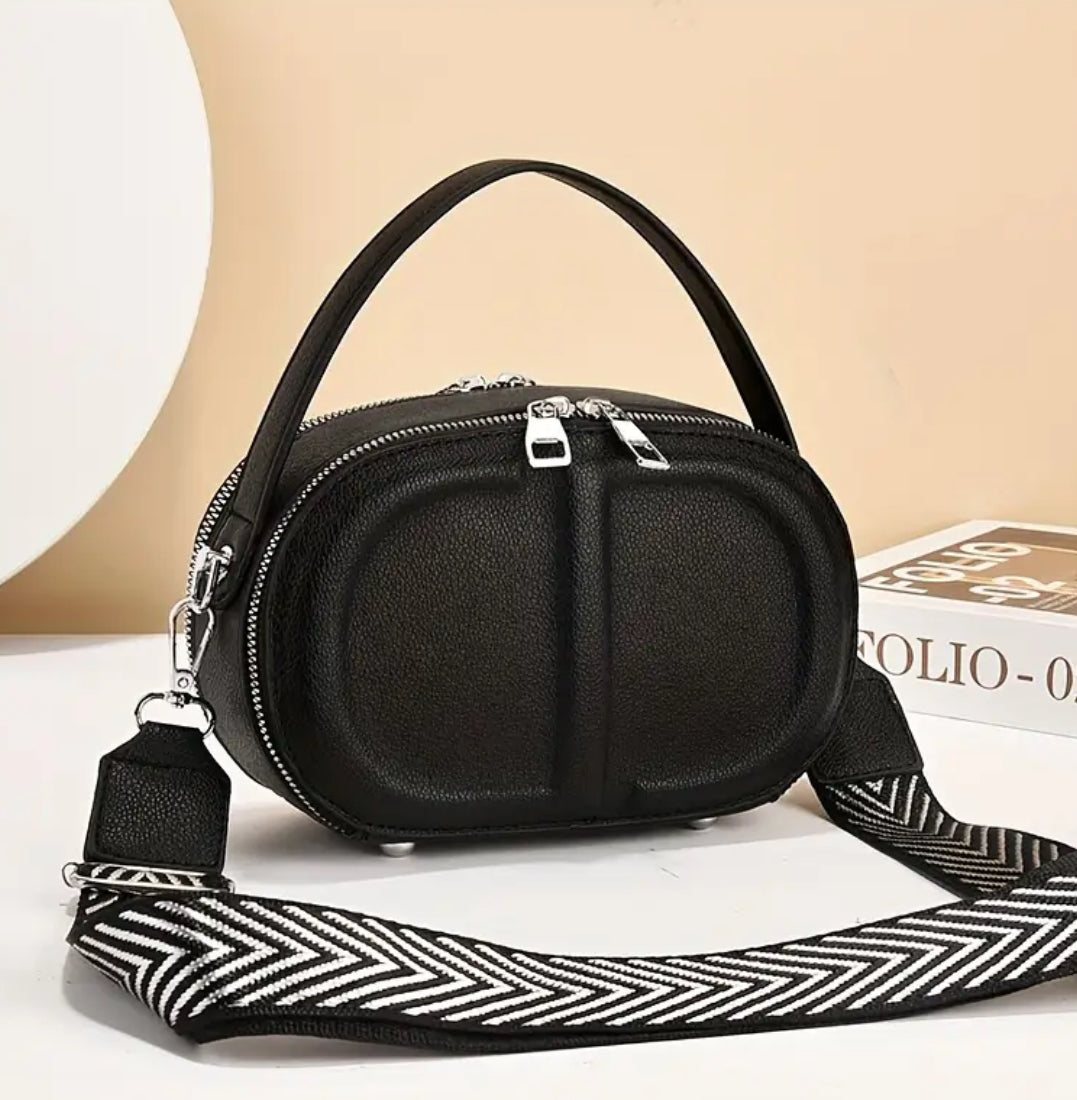 CD letter shapes cross body