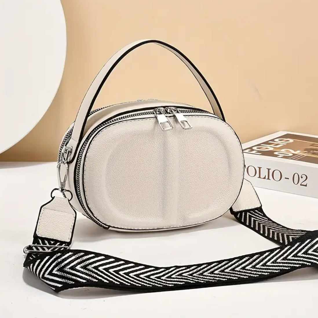 CD letter shapes cross body