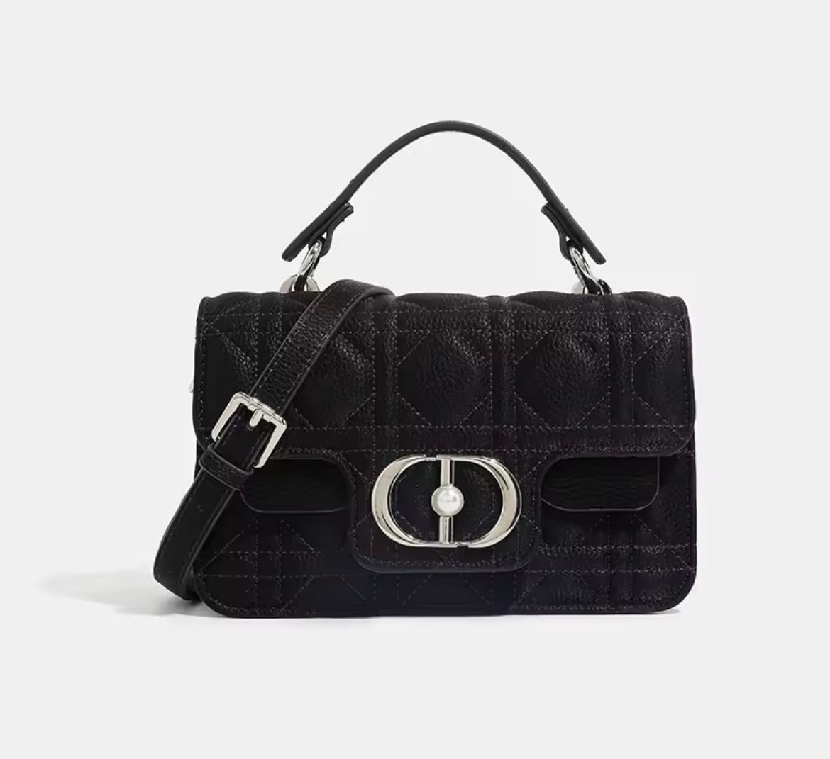 Leather crossbody with hole poke H logo.