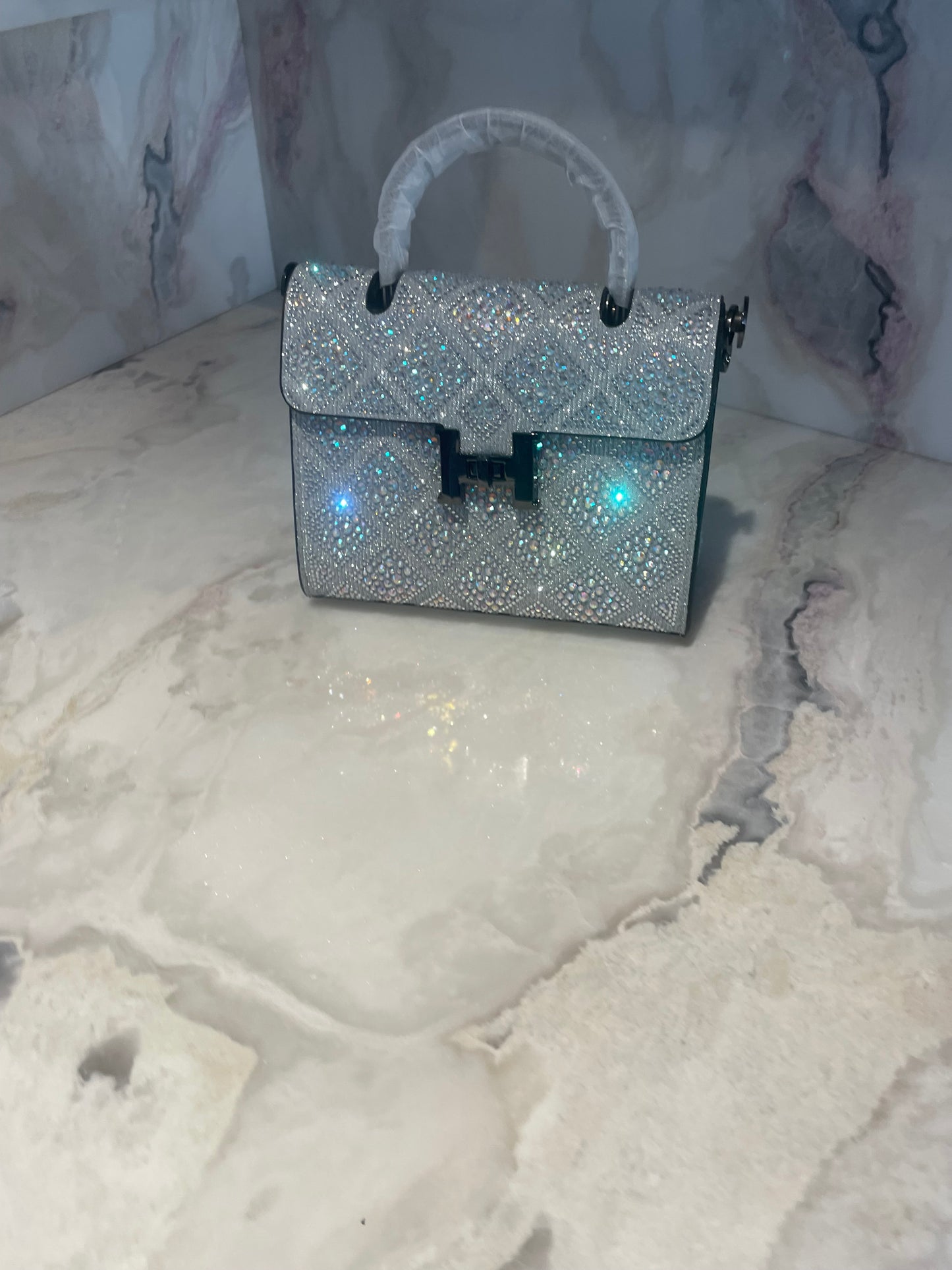 Swarovski Crystal H clutch.