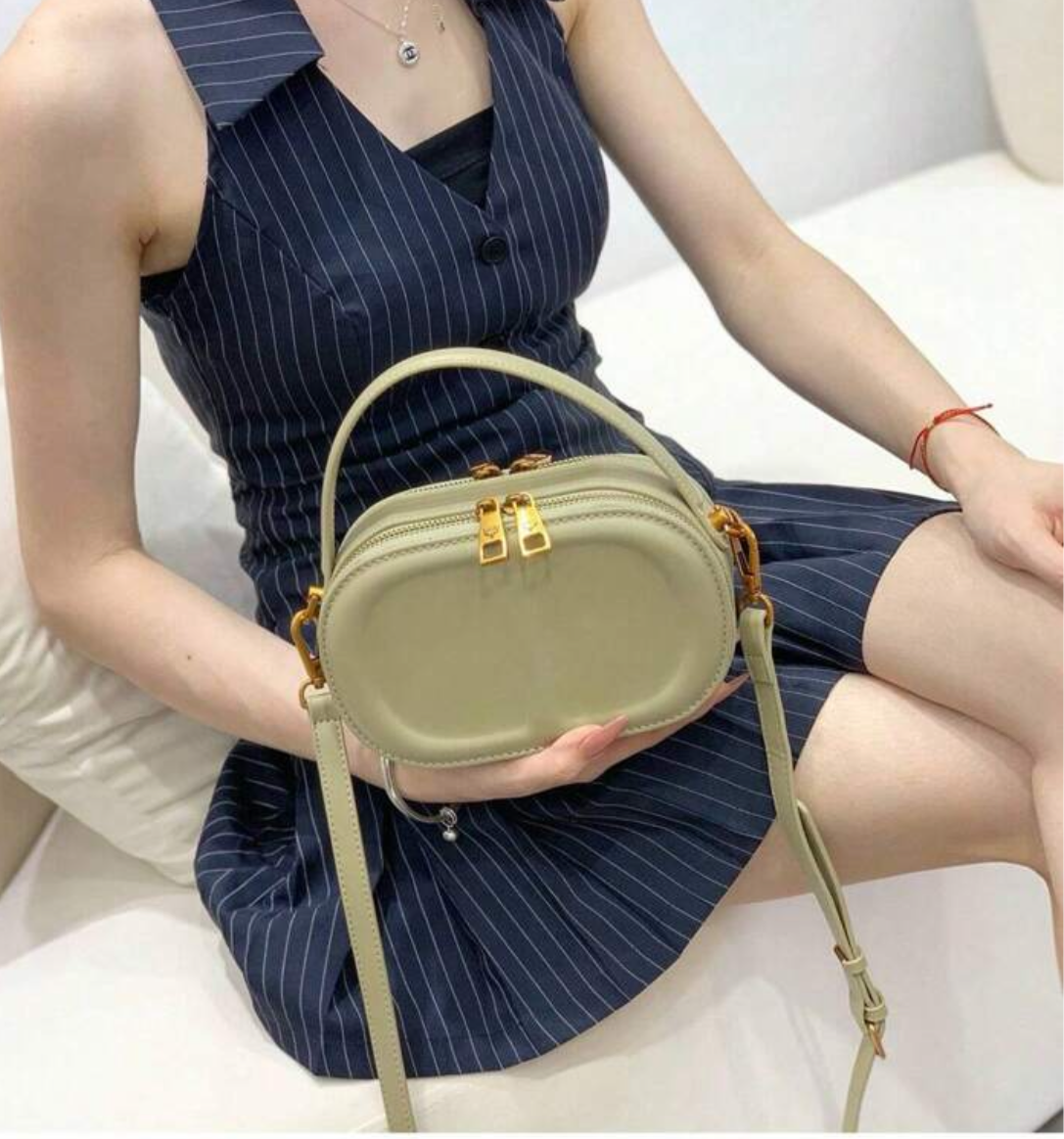 CD letter shapes cross body