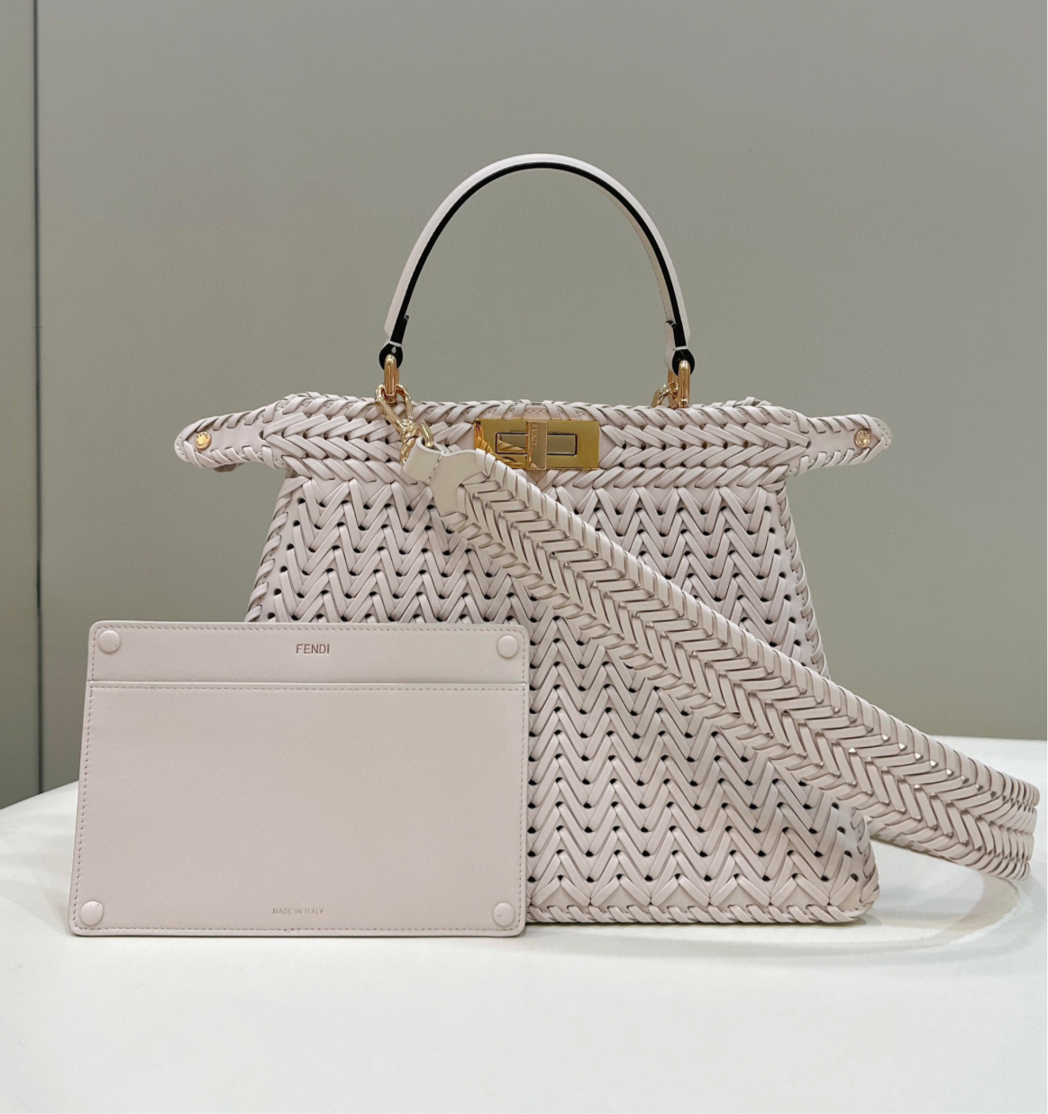 cream/white peekaboo bag. Braided leather.  Braided strap & wallet are not included.