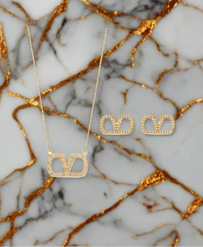 Assorted logo earrings and jewelry sets