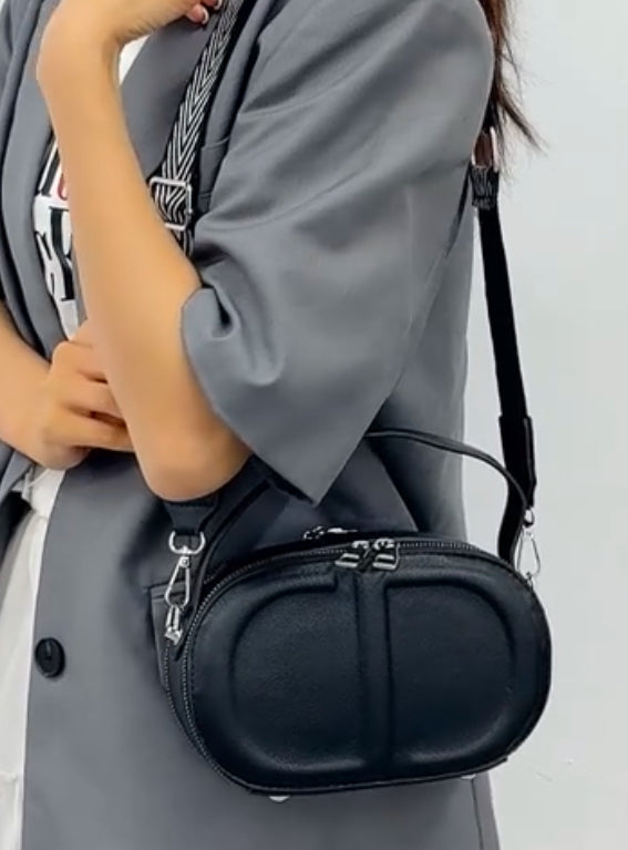CD letter shapes cross body