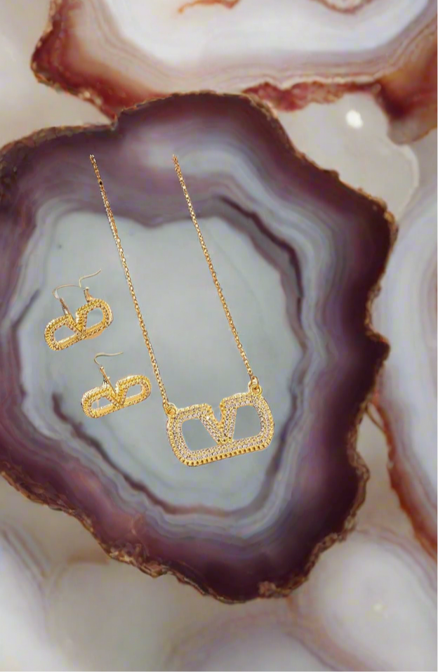 Assorted logo earrings and jewelry sets