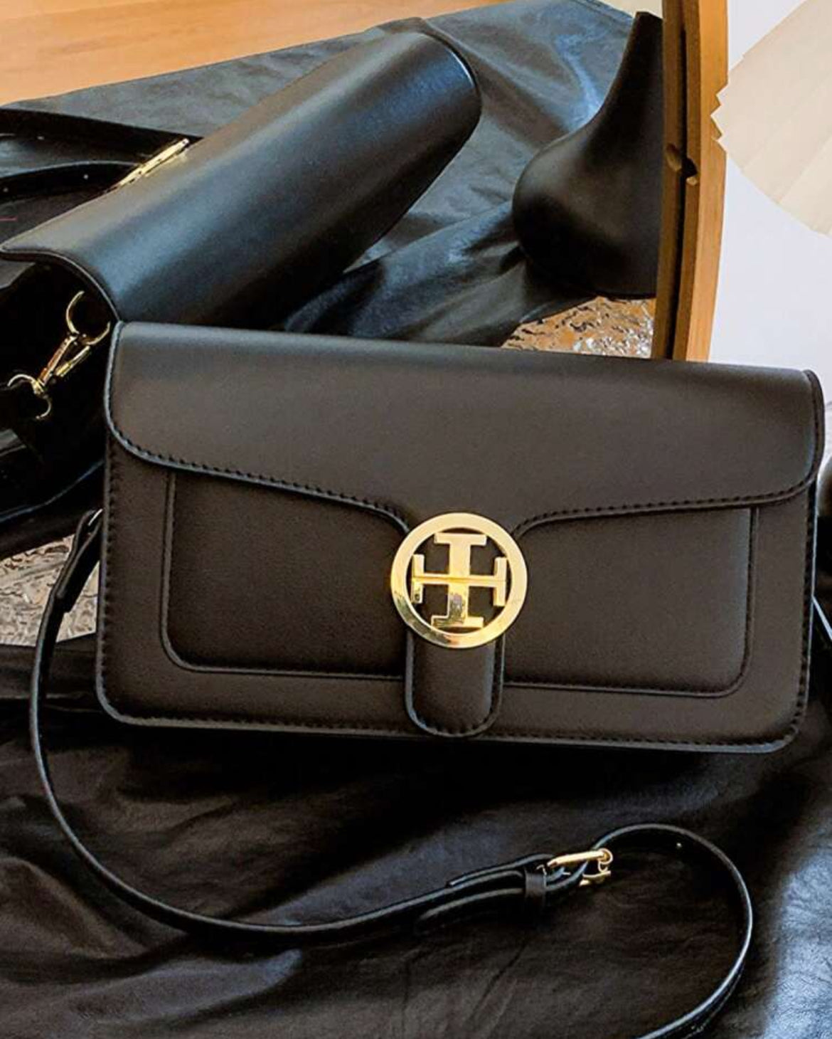 Structured leather ToriB clutch crossbody bag