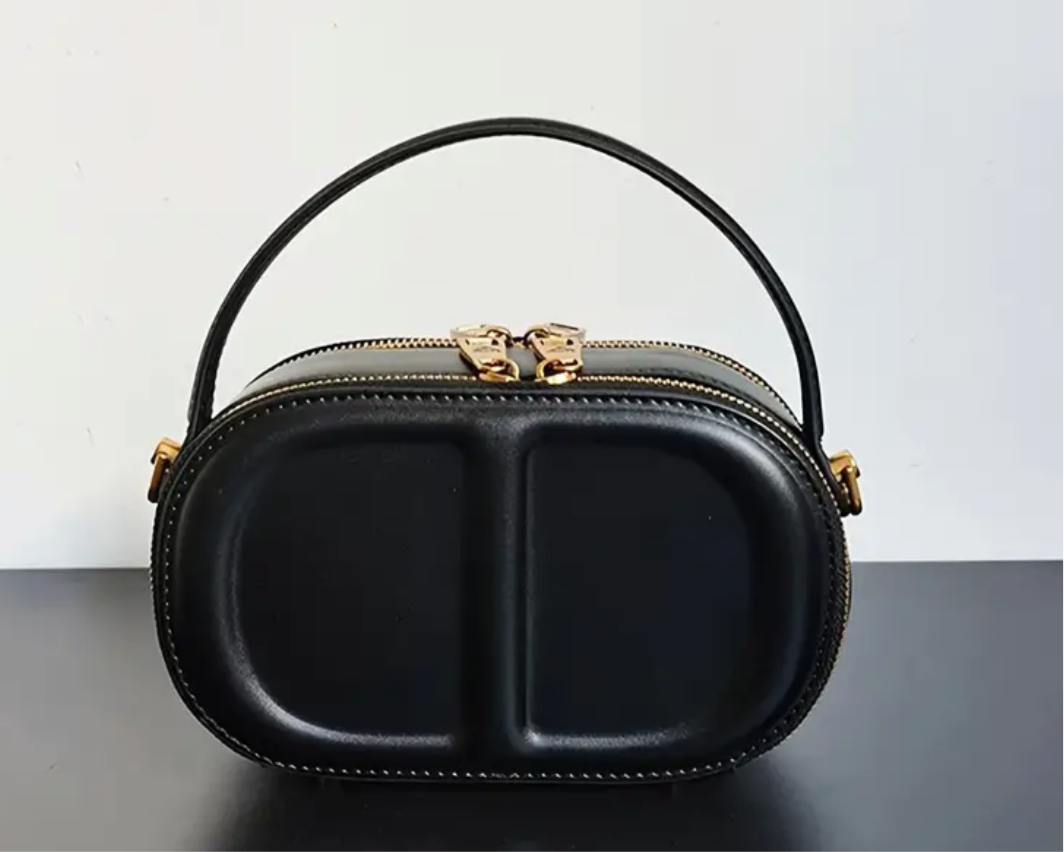 CD letter shapes cross body