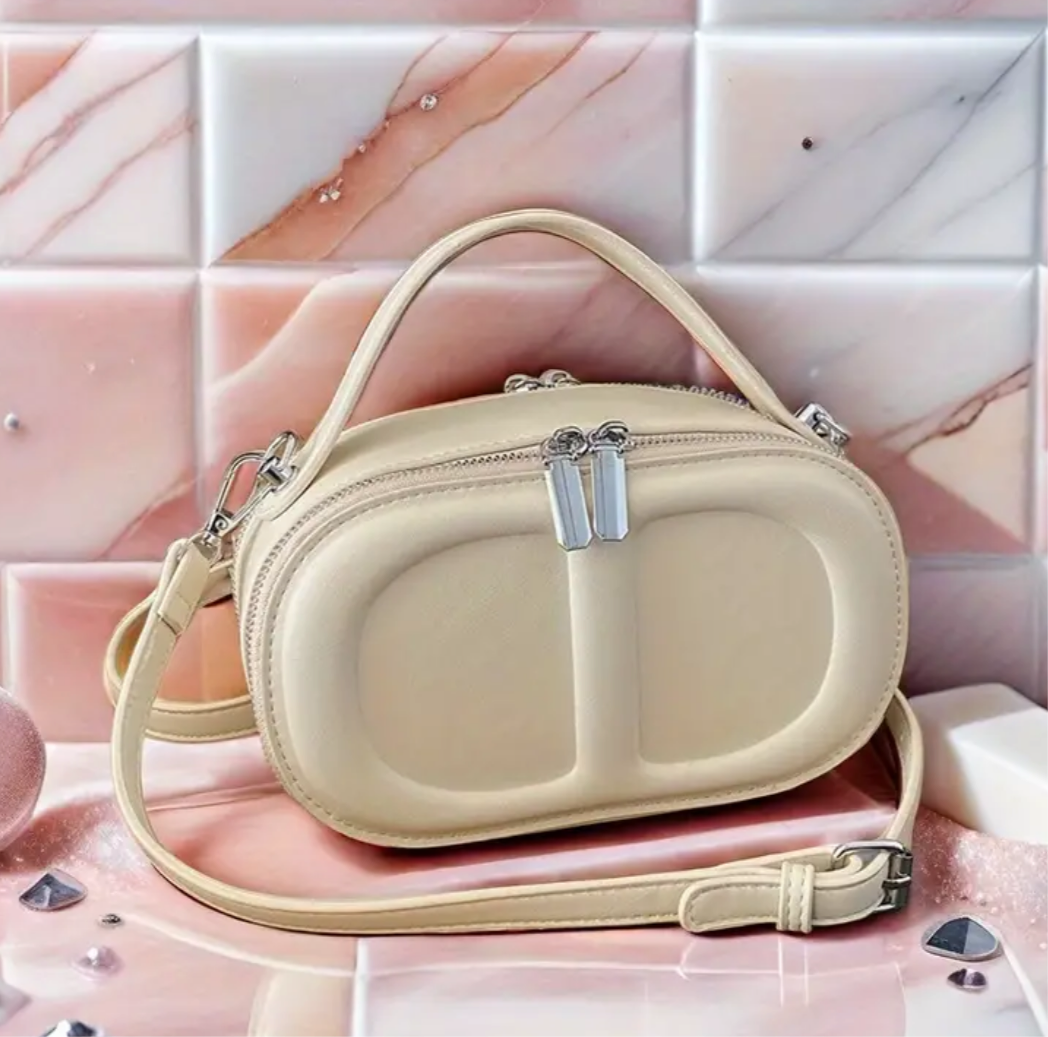 CD letter shapes cross body