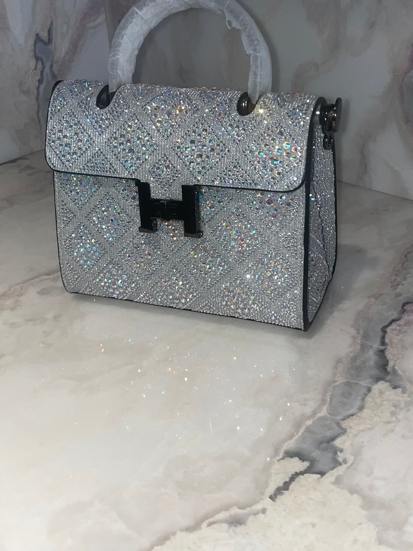 Swarovski Crystal H clutch.