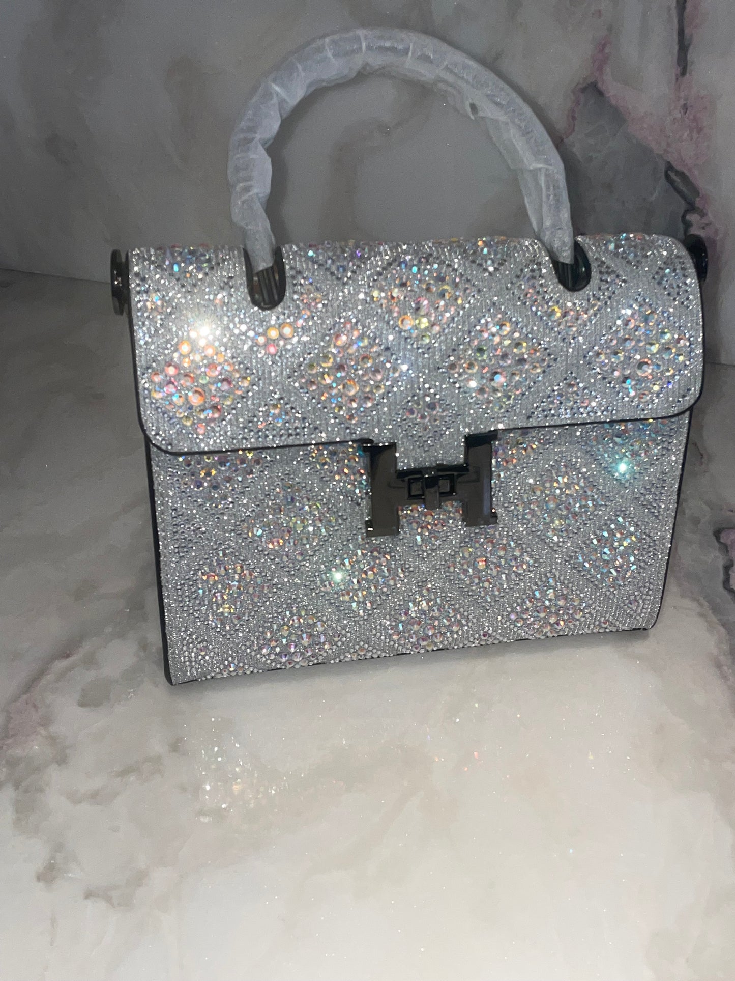 Swarovski Crystal H clutch.