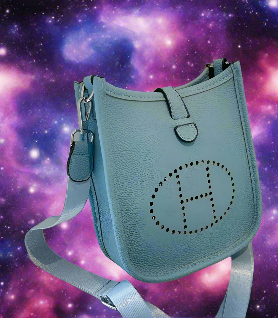 Leather crossbody with hole poke H logo.