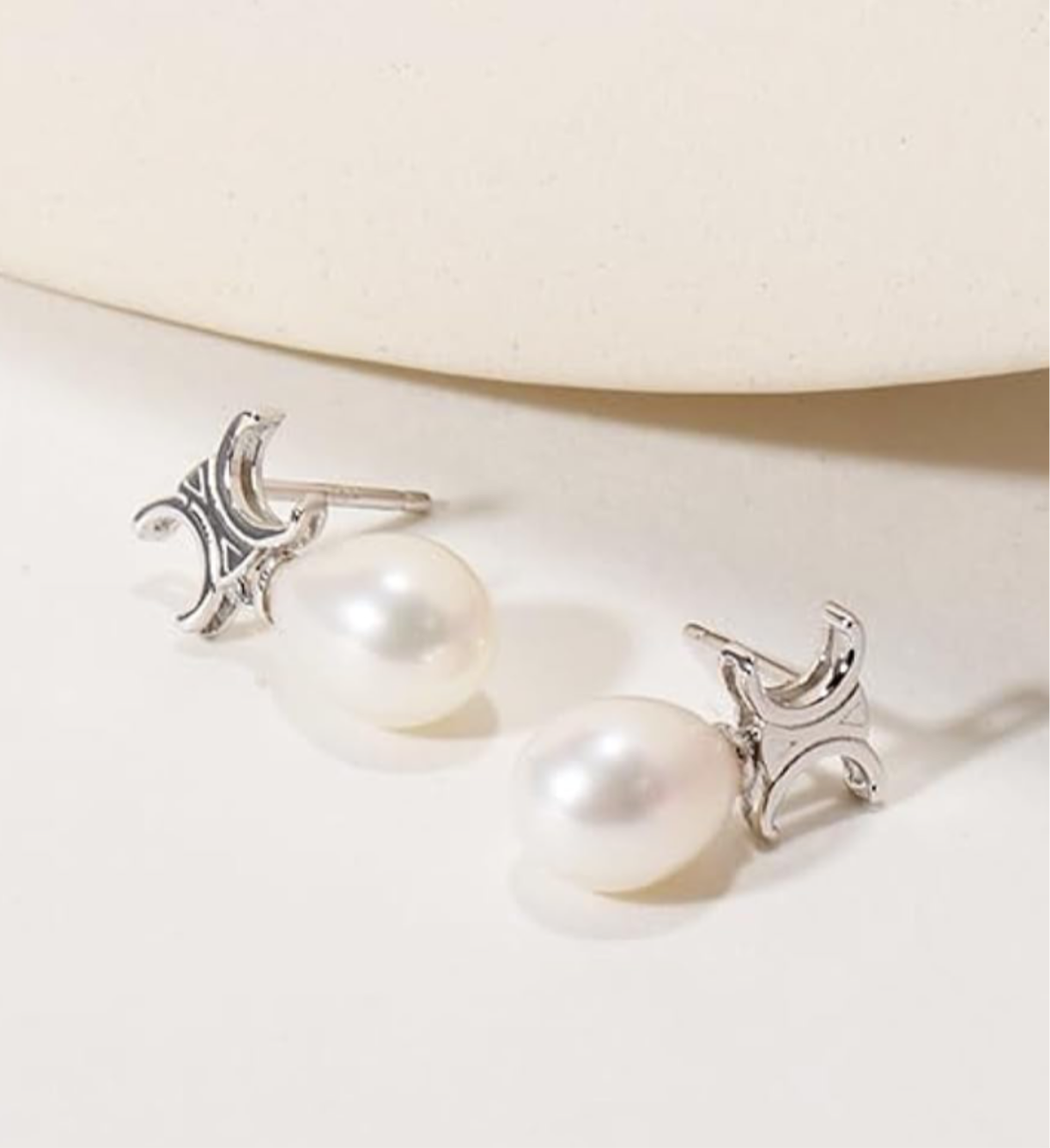 Assorted logo earrings and jewelry sets