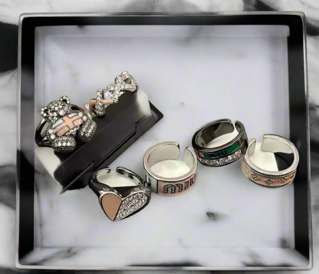Beautiful inspired rings with logos and adjustable bands (large variety)