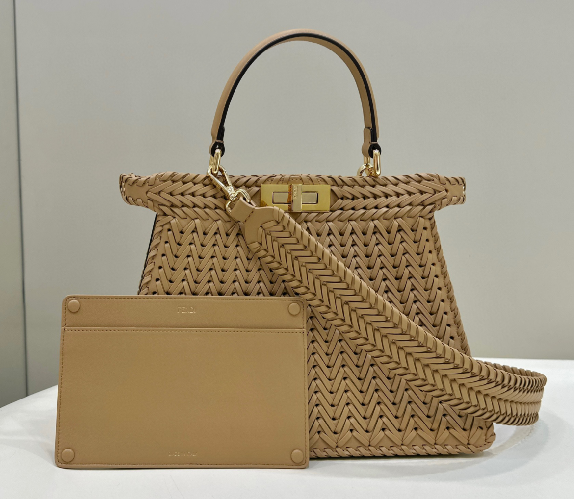 Large braided light beige peekaboo bag.  Wallets are sold separately.