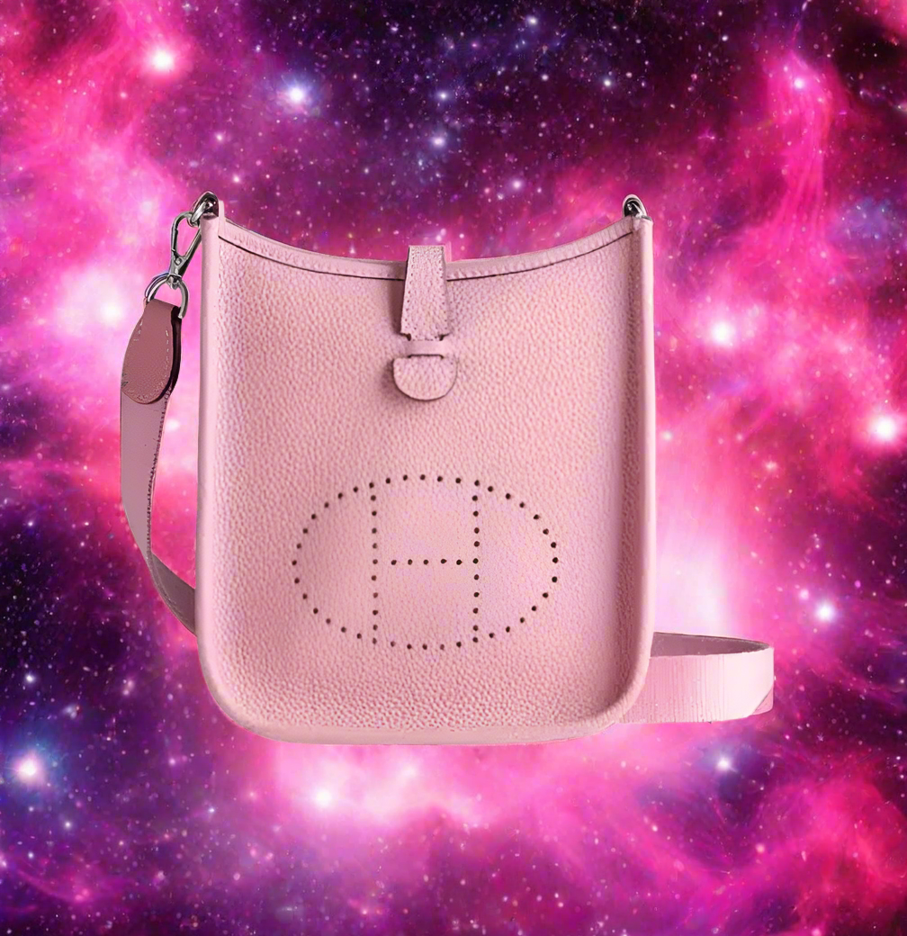 Leather crossbody with hole poke H logo.
