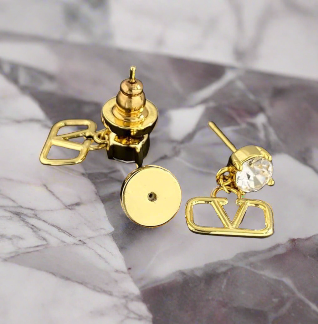 Assorted logo earrings and jewelry sets
