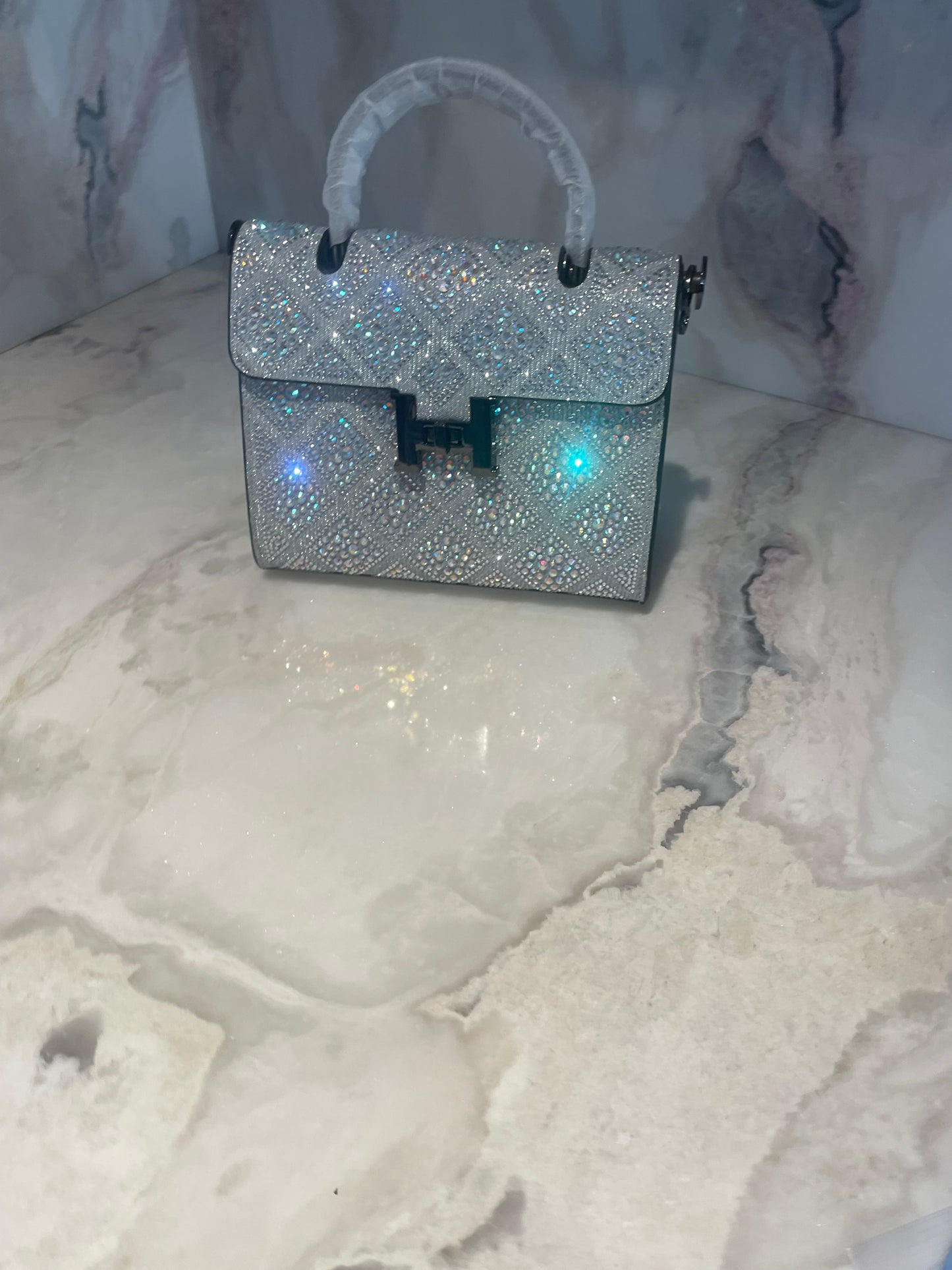 Swarovski Crystal H clutch.