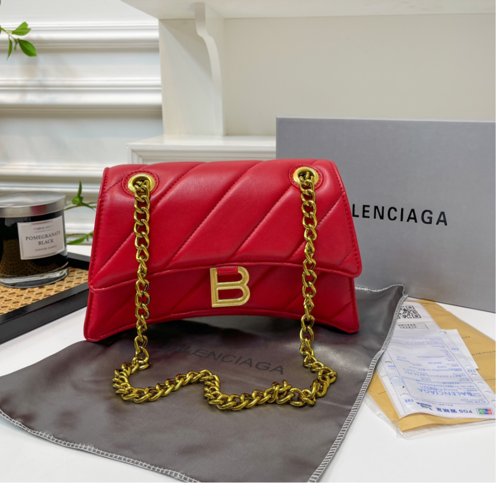 Solid red (large) leather hourglass handbag with diagonal line design & gold hardware, gold chain and gold letter B logo