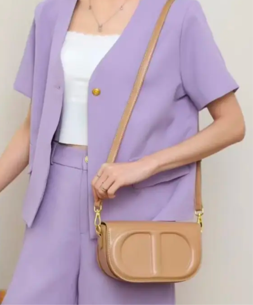 CD letter shapes cross body