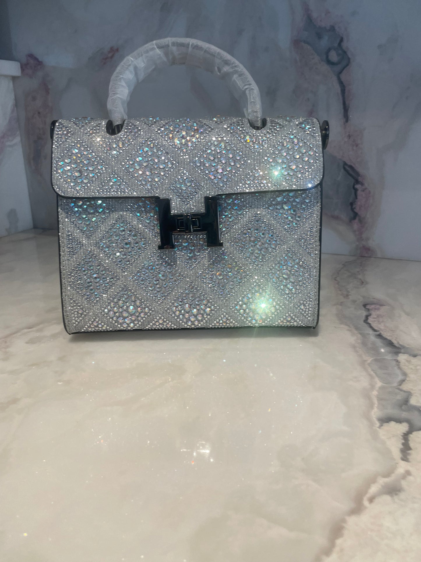 Swarovski Crystal H clutch.