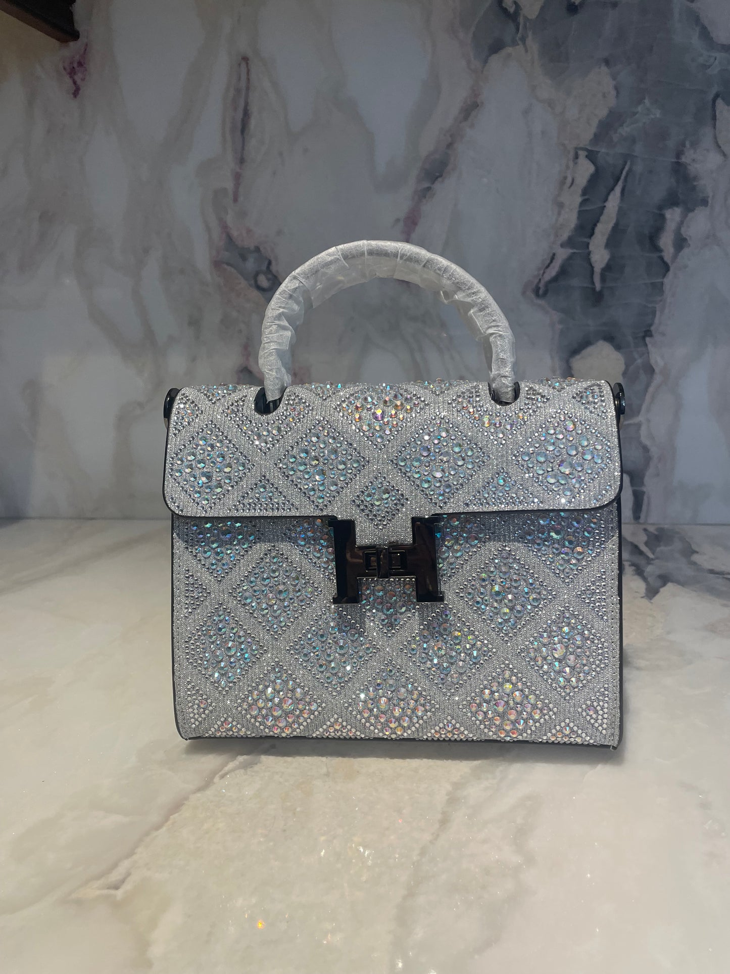 Swarovski Crystal H clutch.
