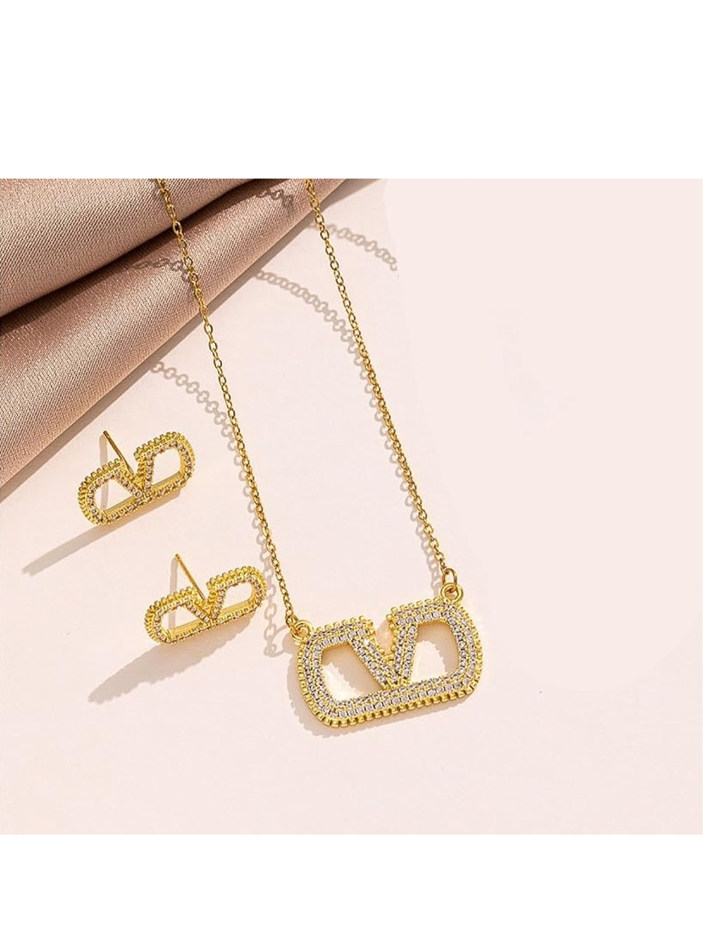 Assorted logo earrings and jewelry sets