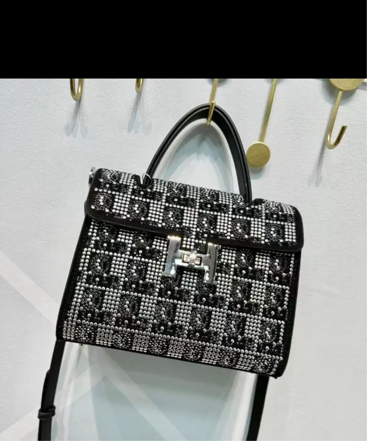 Swarovski Crystal H clutch.