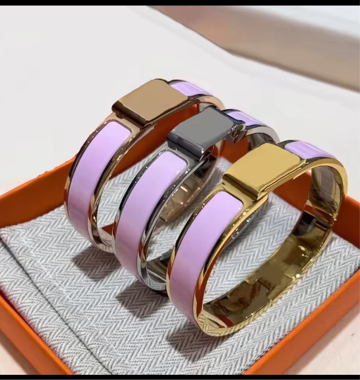 Thick band letter H bangle
