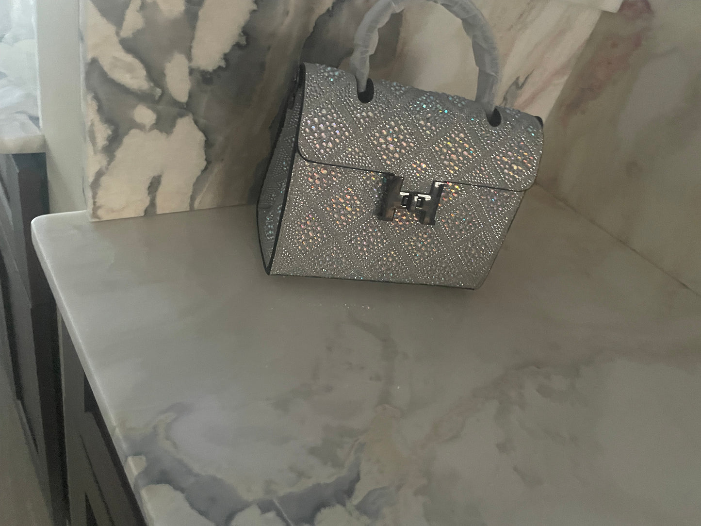 Swarovski Crystal H clutch.