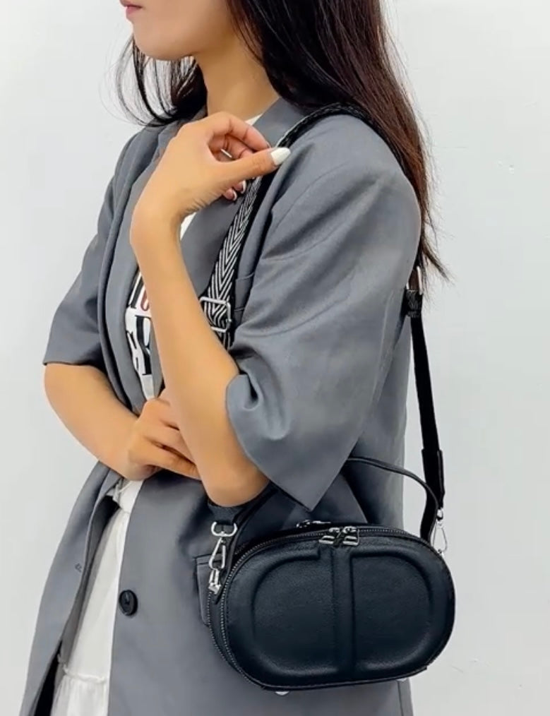 CD letter shapes cross body