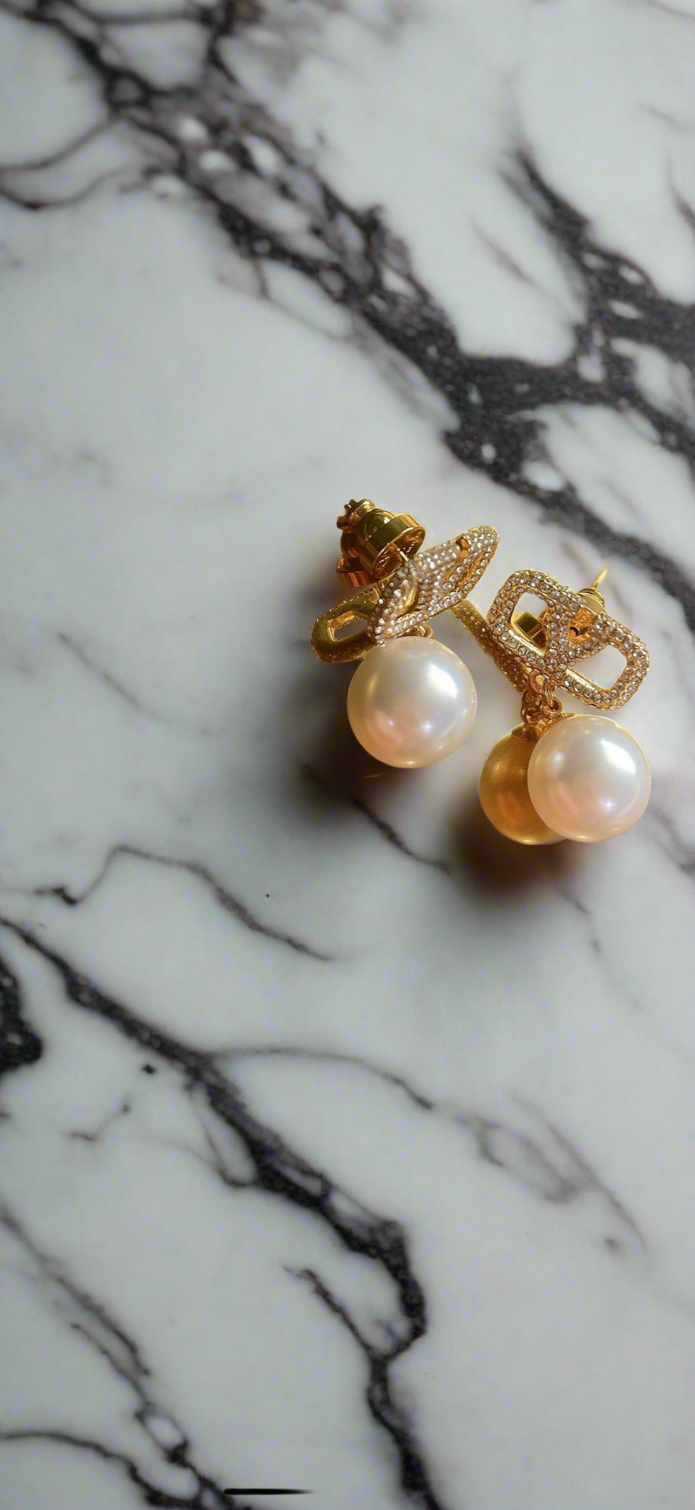 Assorted logo earrings and jewelry sets