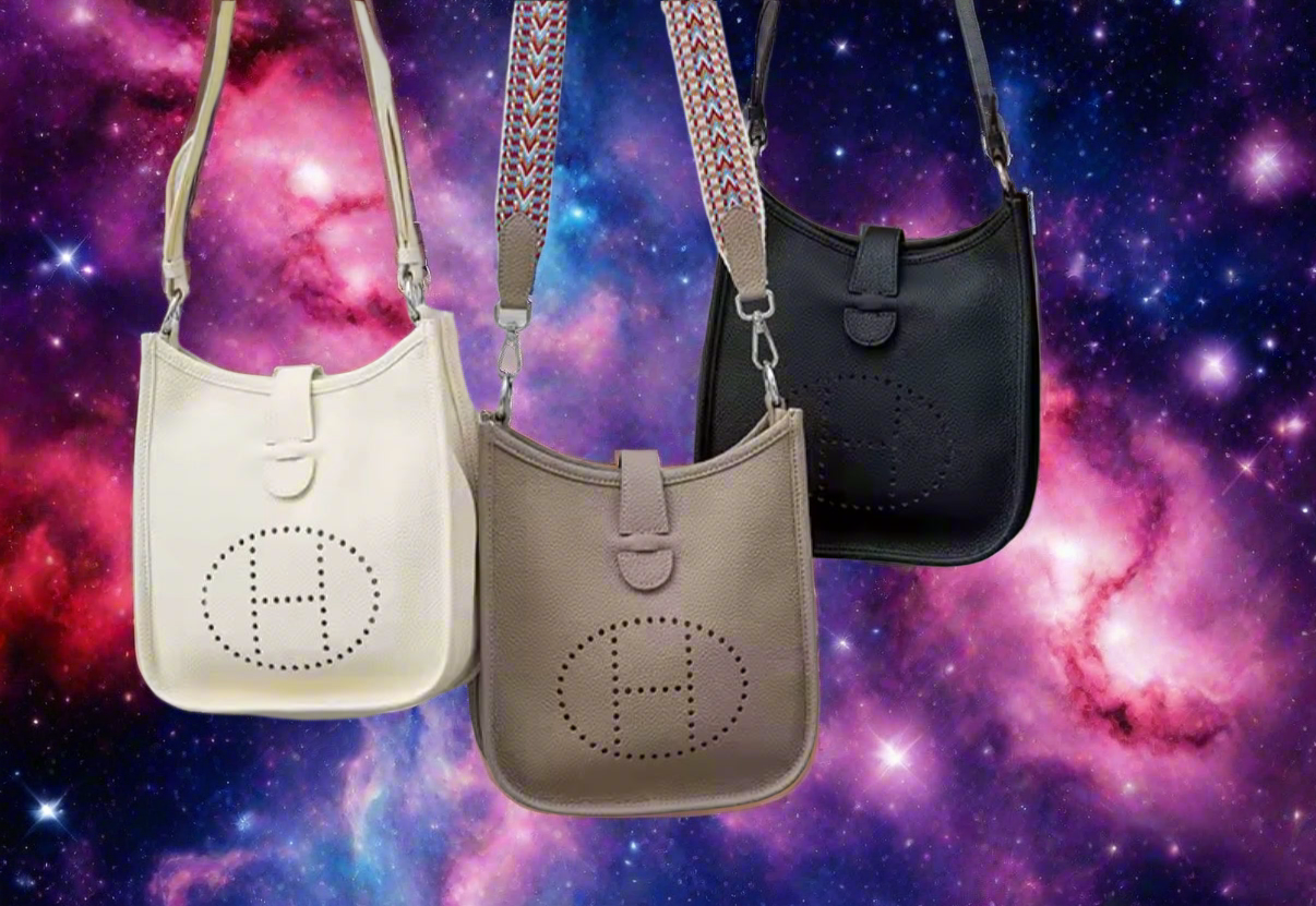 Leather crossbody with hole poke H logo.
