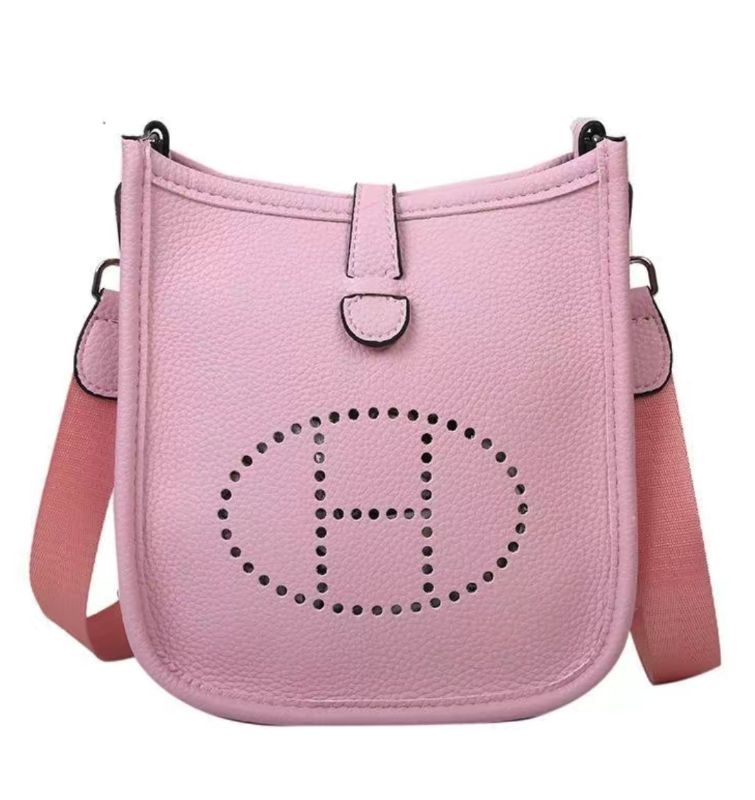 Leather crossbody with hole poke H logo.