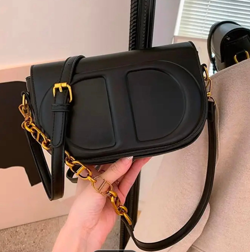 CD letter shapes cross body