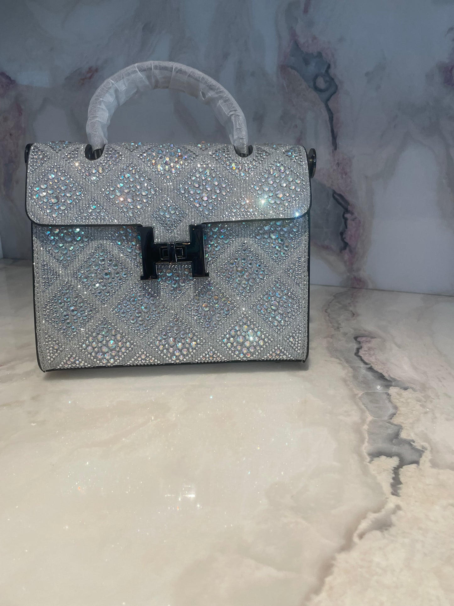Swarovski Crystal H clutch.